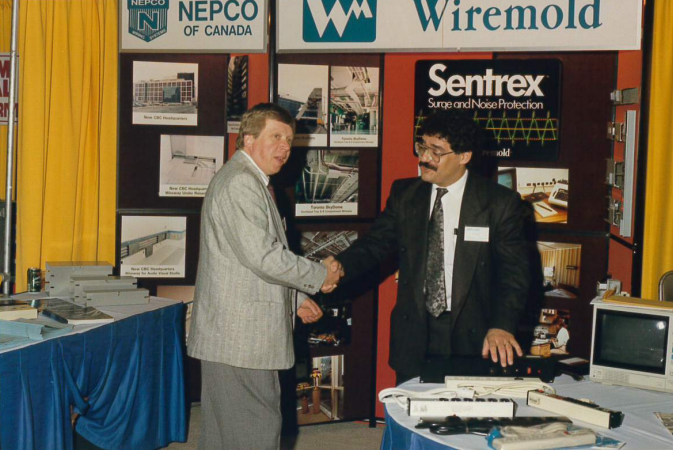 Wiremold Booth Handshake